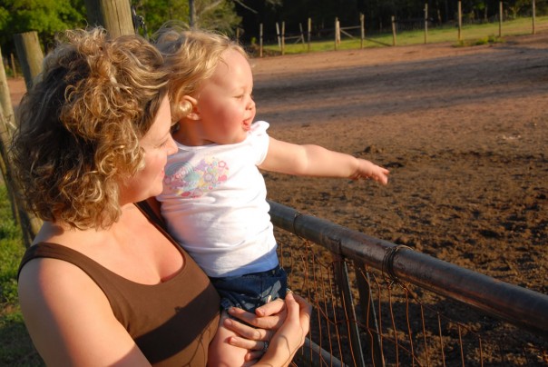 Emma Kate looking at the horses next door