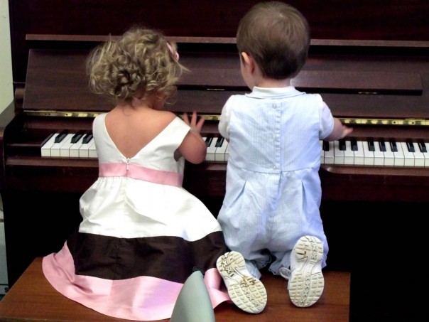 playing a duet on the piano w/ Robert