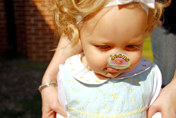 EK sporting a Jesus sticker on her nose