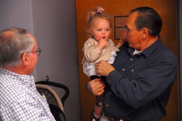 Being held by Uncle Junior (my dad's brother)