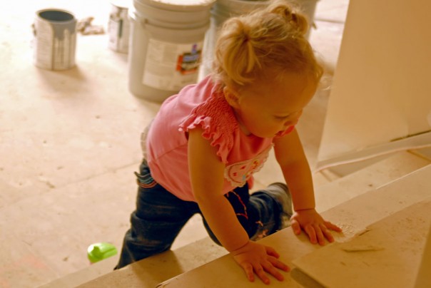 Emma Kate climbing the stairs in Jadon's new house