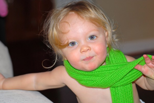 Fashion a green scarf and no shirt