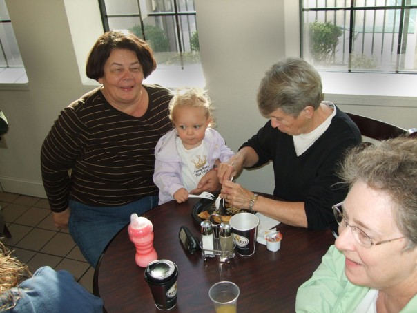 EK eating breakfast with Grandma, Aunt Sylvia, and Aunt Delaine