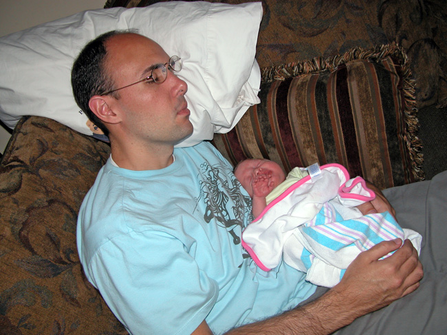 Bradley dozing with Emma Kate